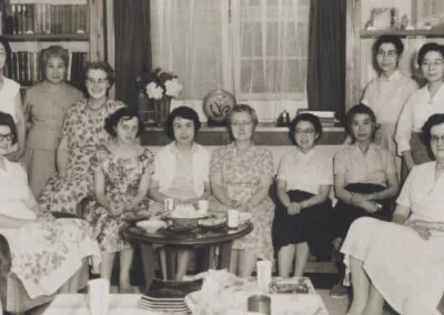 Deaconess Daphne Rogers (left end of couch) was on the teaching staff of Toyo Eiwa school for girls in Japan. She served in Japan from 1959 until her retirement in 1994.
